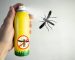 Mosquito spray. In the hand is an insecticide. Mosquito icon, warning sign.Prevention of infections transmitted by parasites.